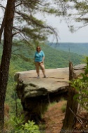My bestie looking mighty brave on a rock ledge